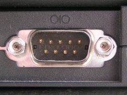 A male DE-9 connector used for a serial port on a PC style computer.